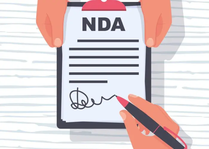 Everyday Australian reading a non-disclosure agreement at home before signing it